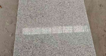 克拉玛依芝麻白光面毛板