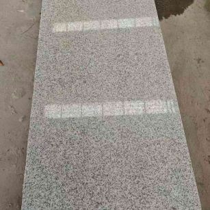 克拉玛依芝麻白光面毛板